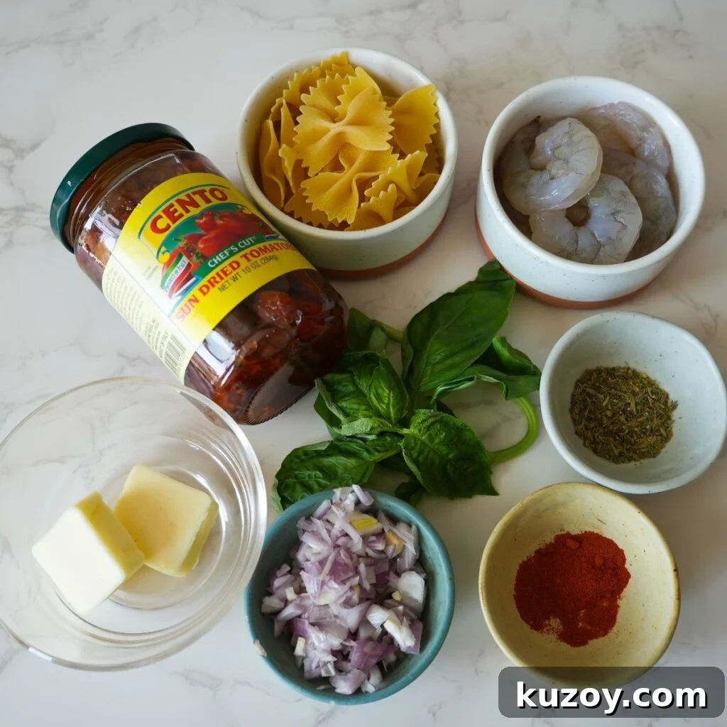 Ingredients for creamy sun dried tomato pasta: sun dried tomatoes, pasta, shrimp, seasonings, basil, butter and shallots.